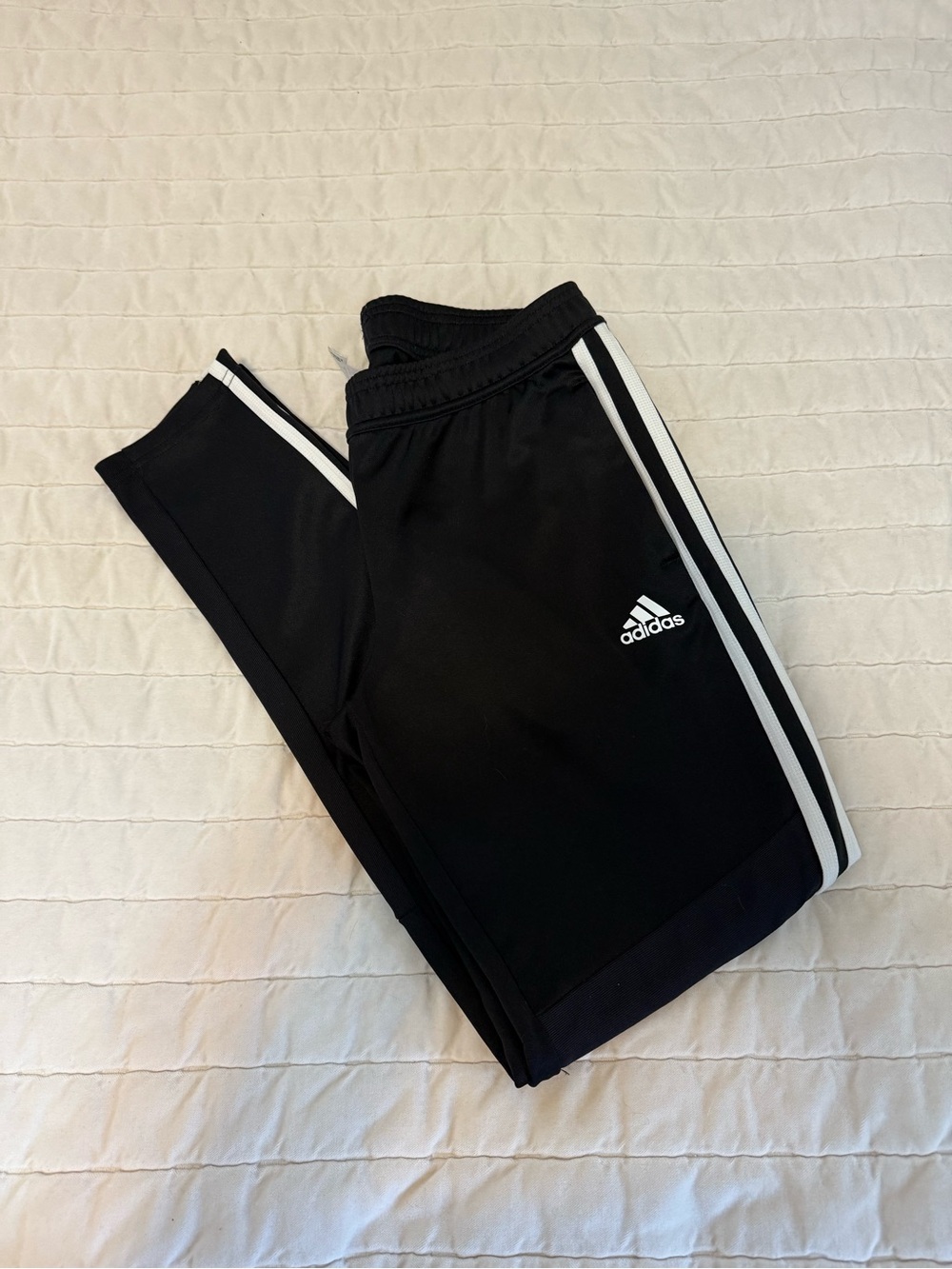 Adidas Womenโs Black Jogger Pants with White Three-Stripes